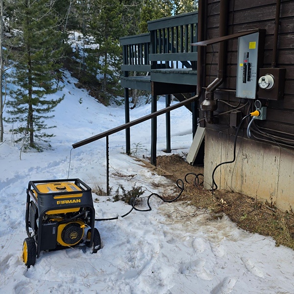 Mechanical engineer AJ Quick's 50A generator interlock and inlet installation for emergency home backup.